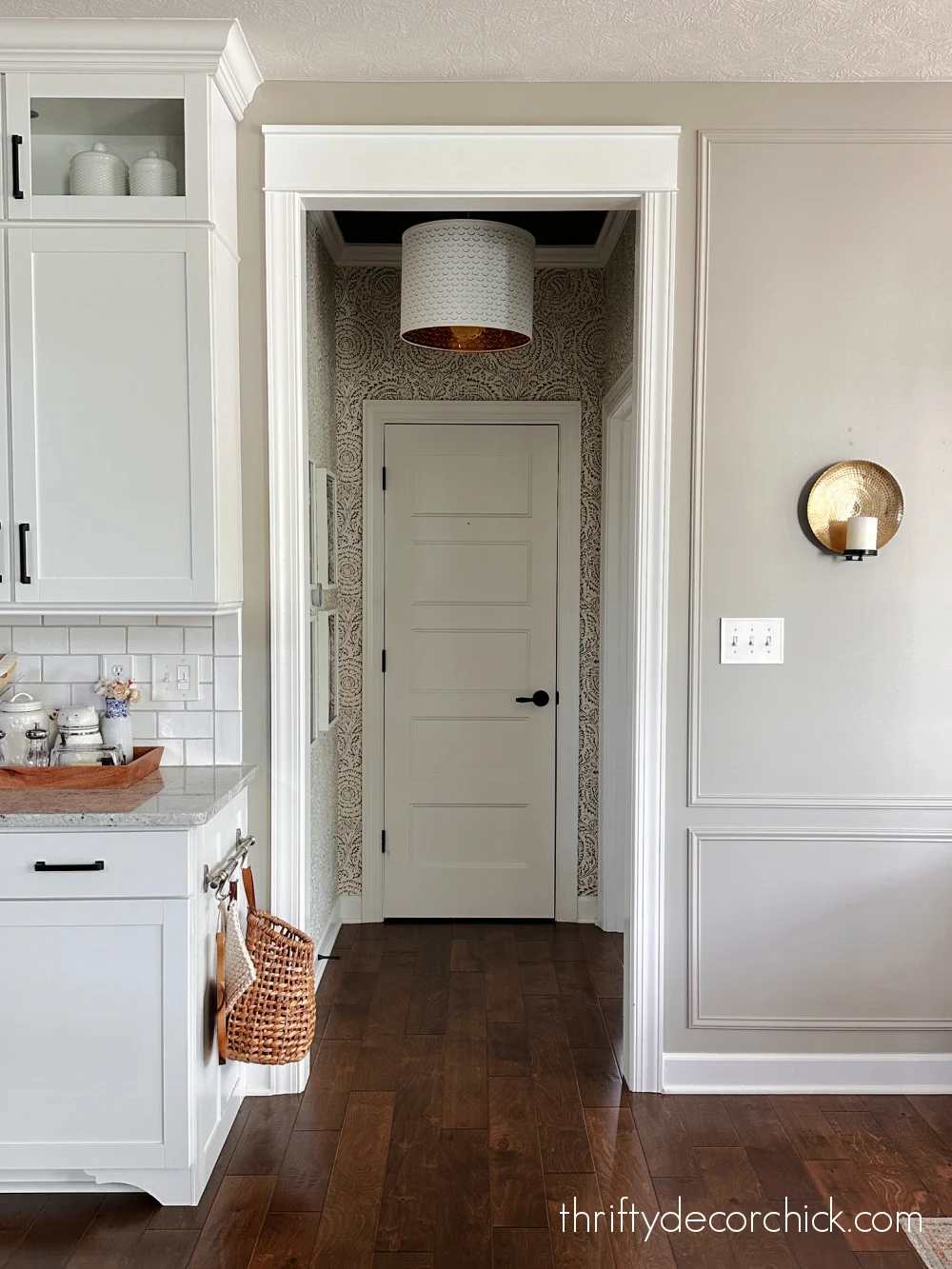 small floral wallpapered hallway