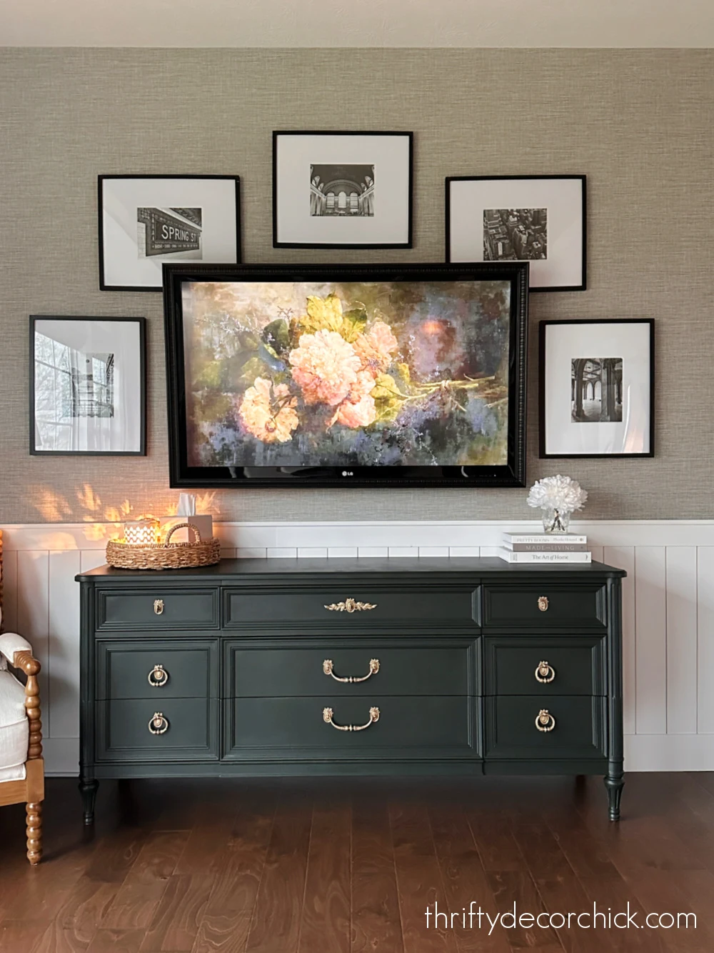 black frame on television green dresser