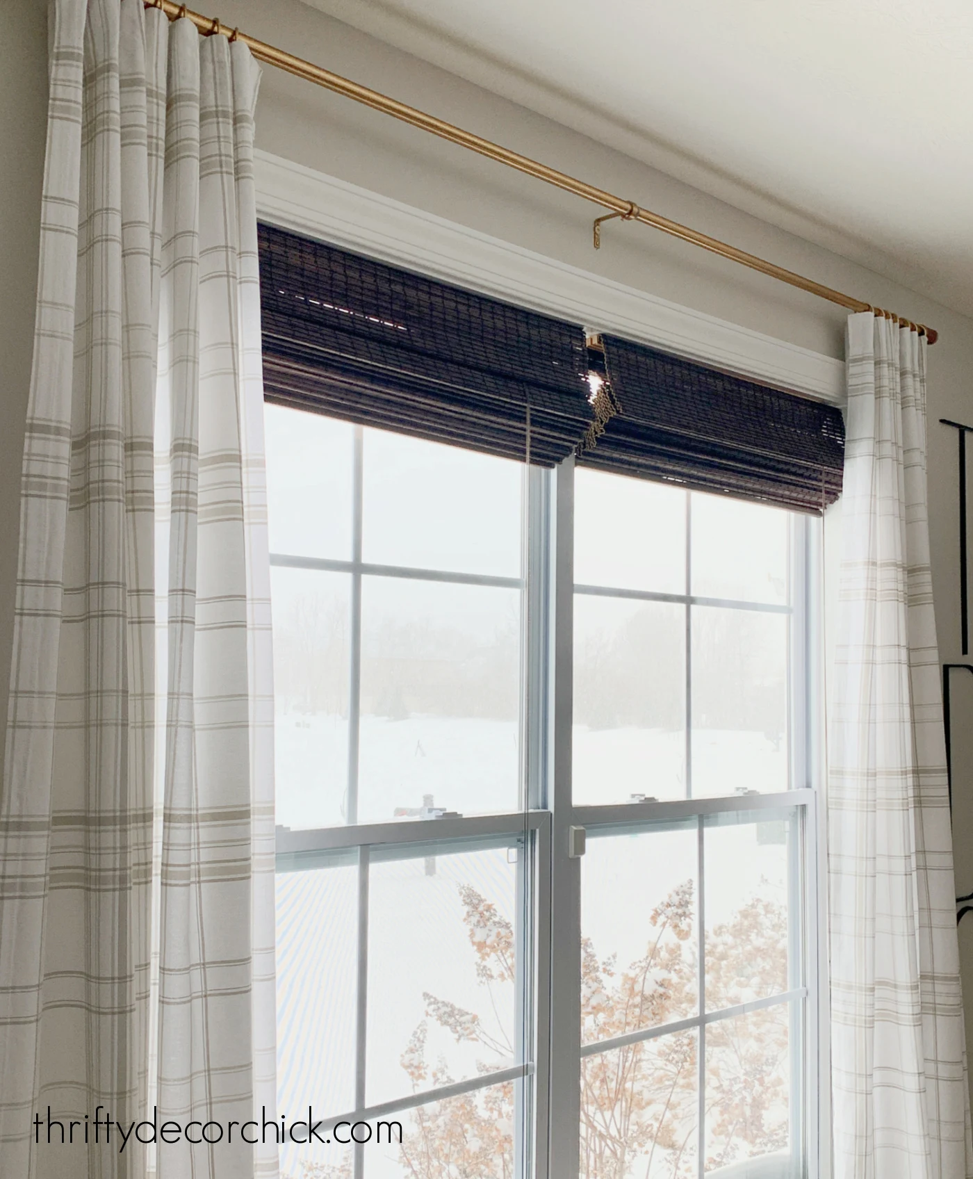 cream drapes bamboo shades