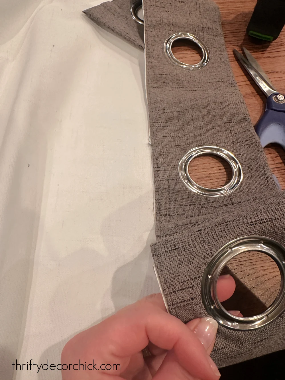 cutting off grommets on drapes