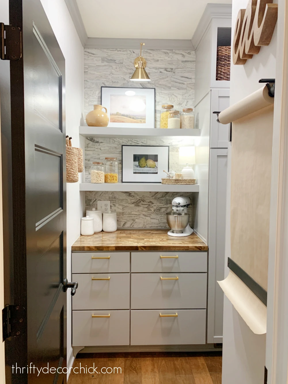 pantry with wood shelves