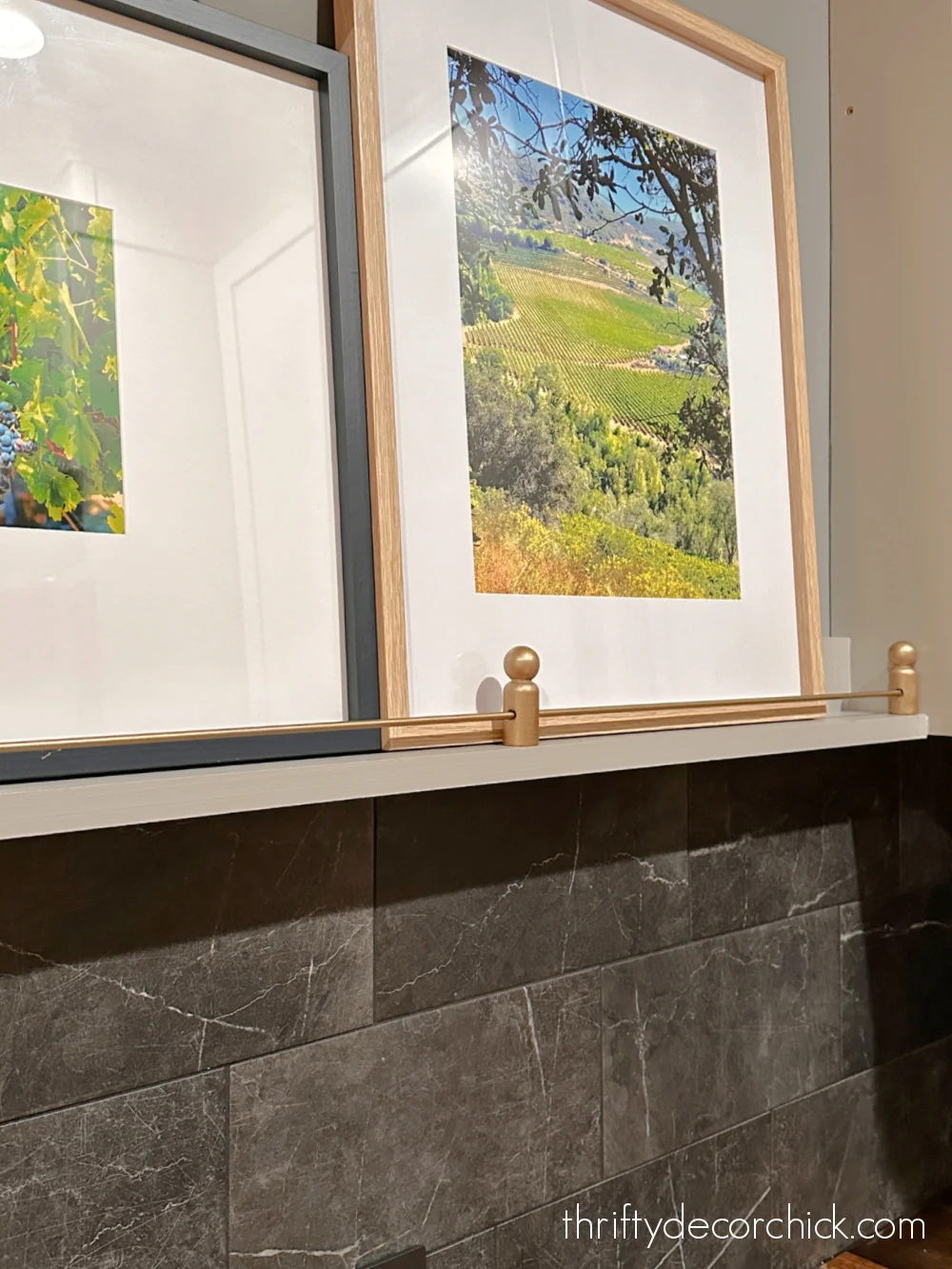 DIY brass gallery rail on shelf