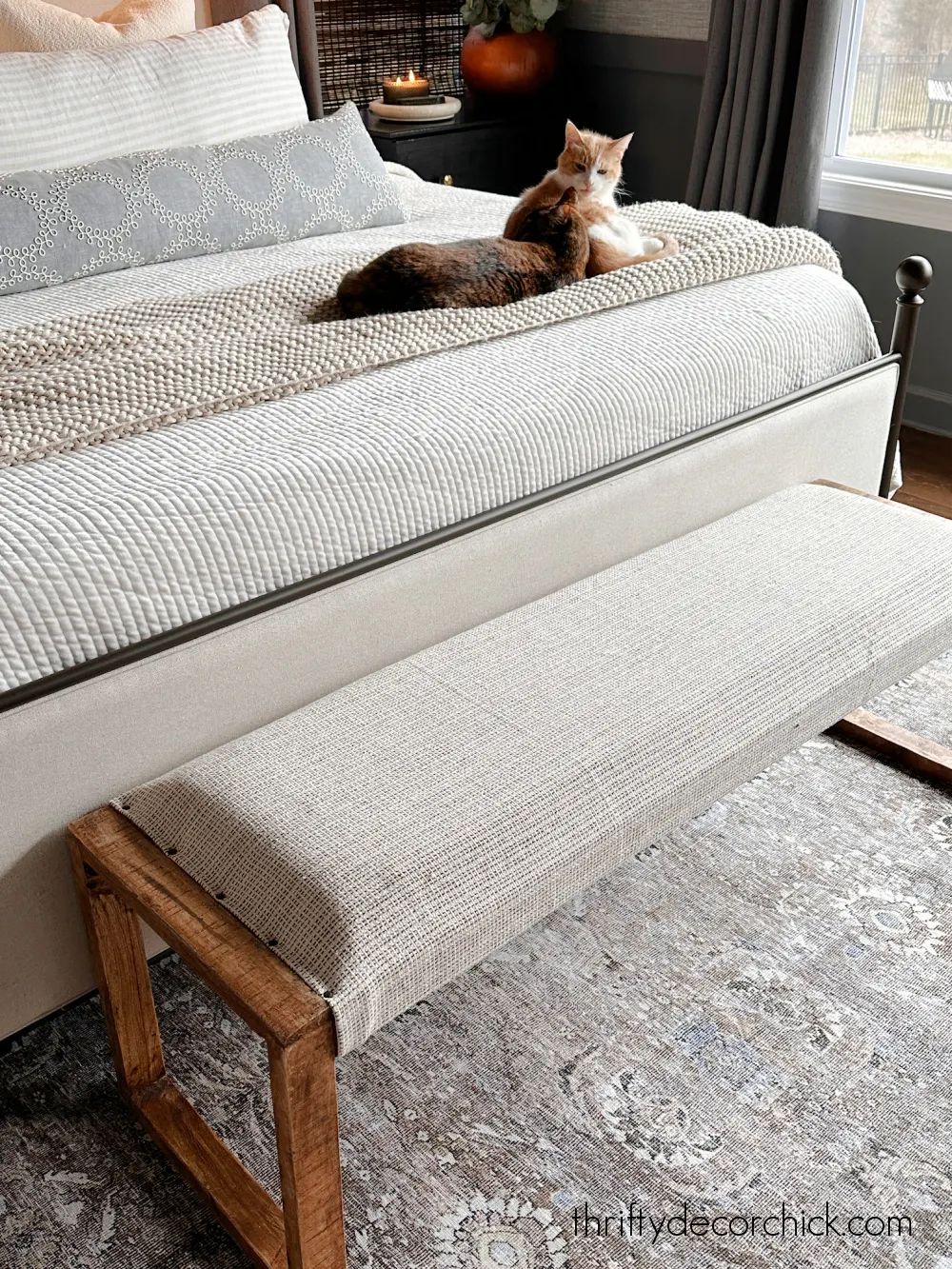 wood bench covered with rug