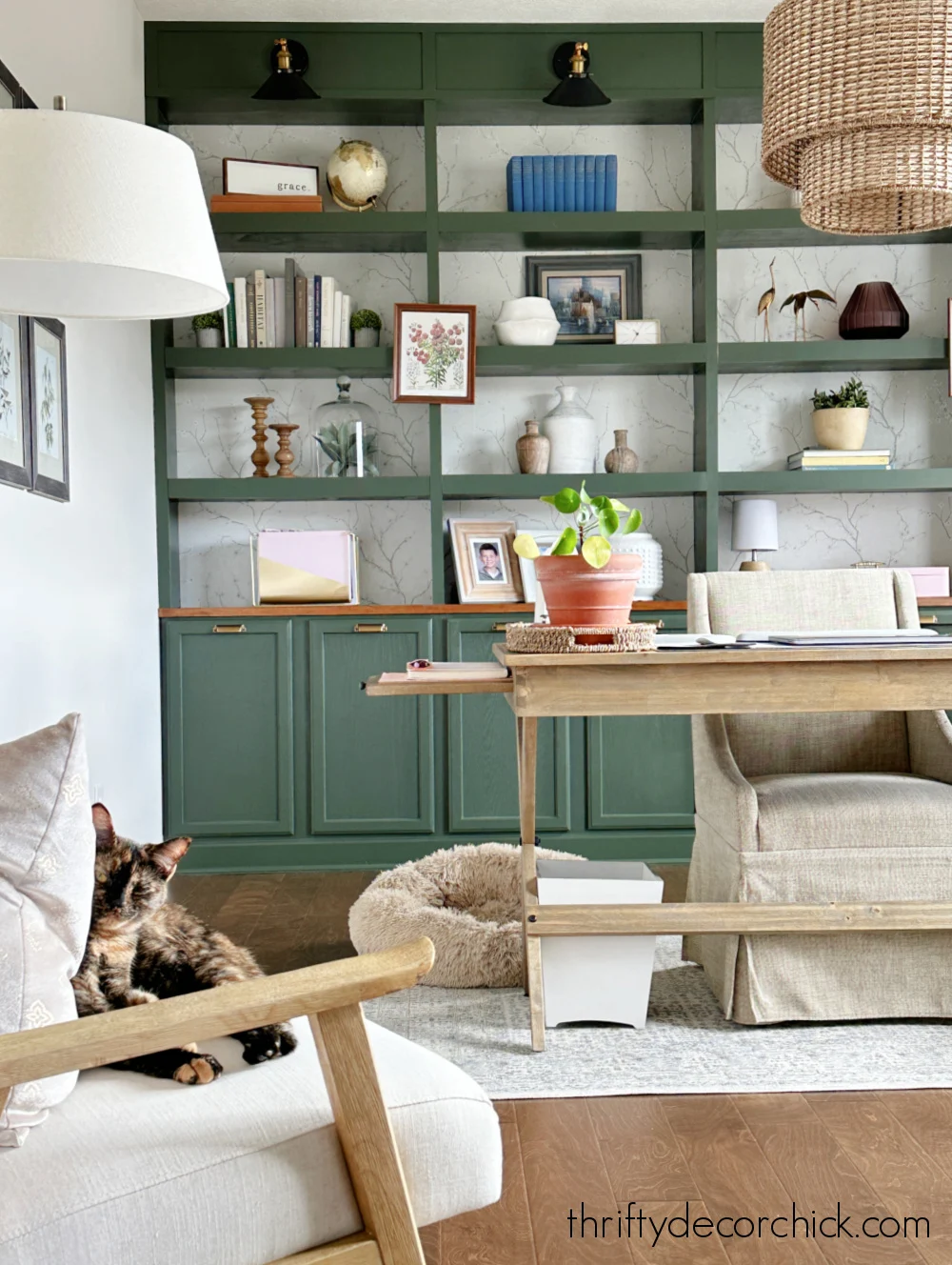 dark green bookcase wall