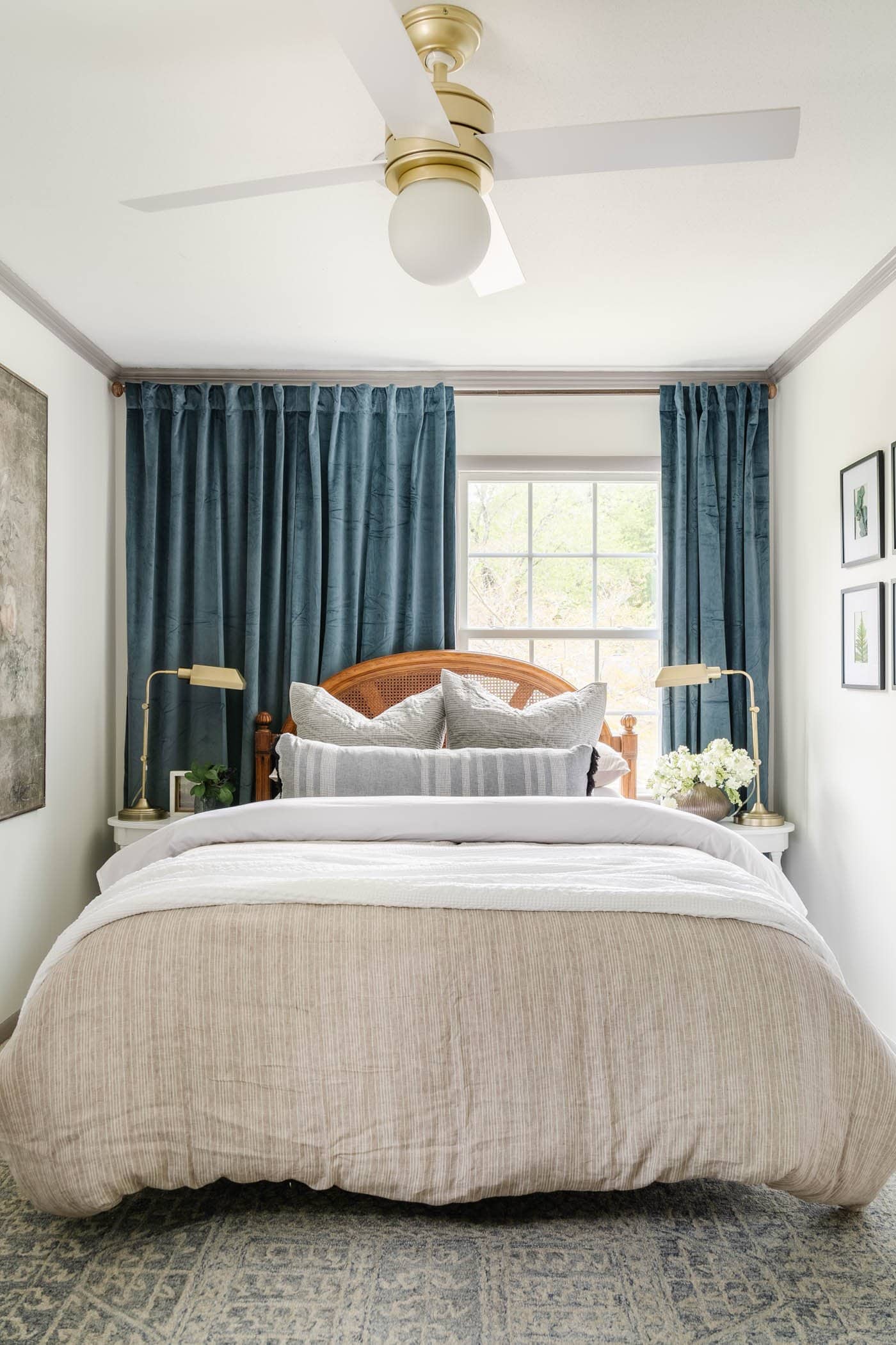 bedroom with off centered window behind bed