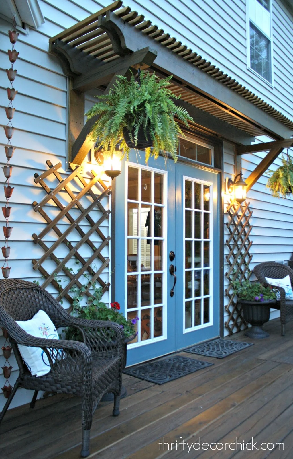 wood pergola over patio doors