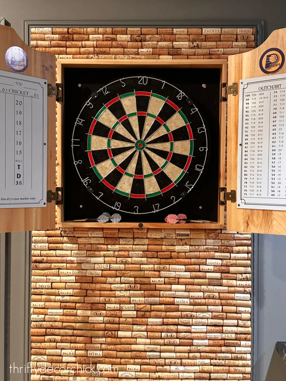 wine cork behind dart board