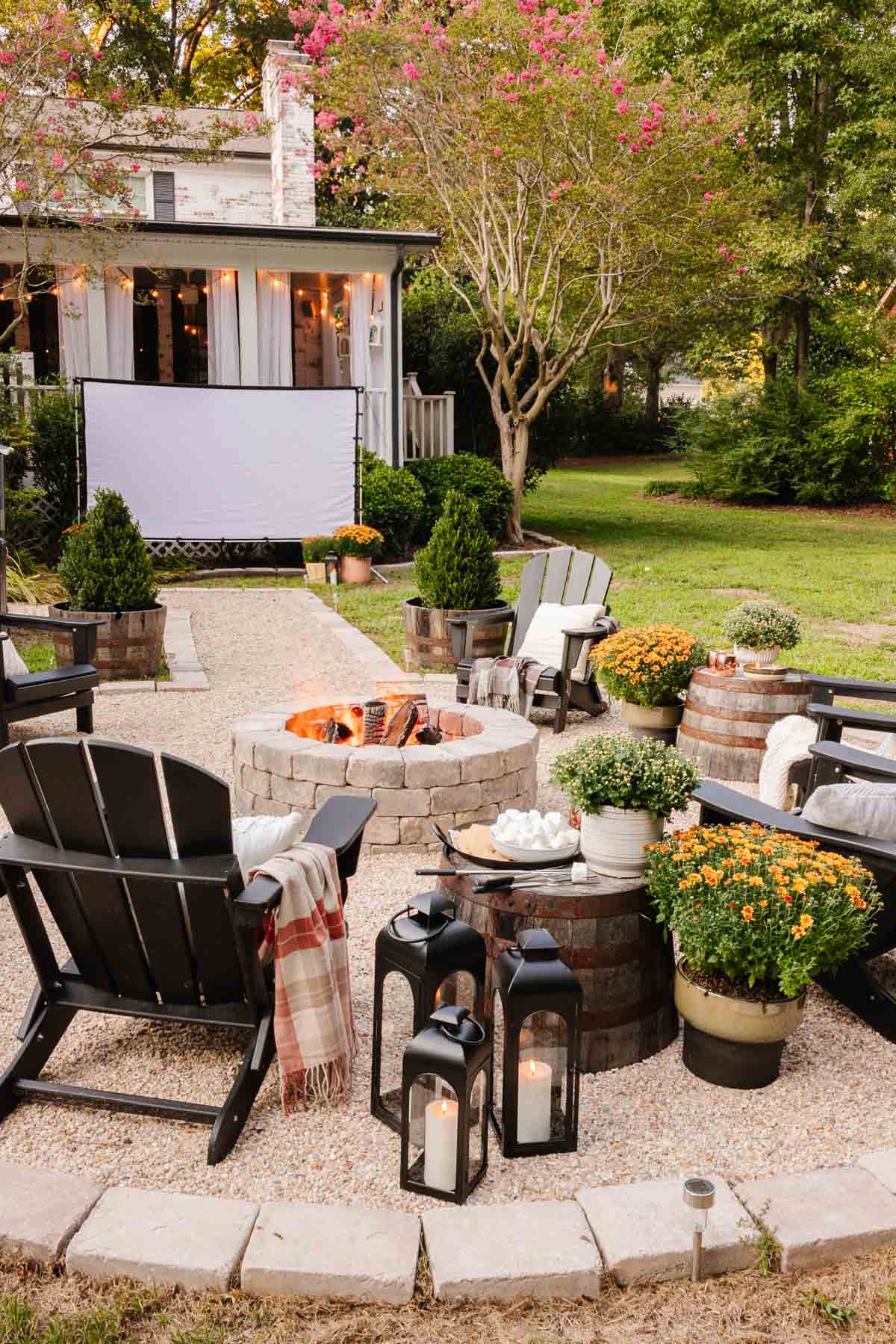 backyard fire pit with best outdoor movie setup 