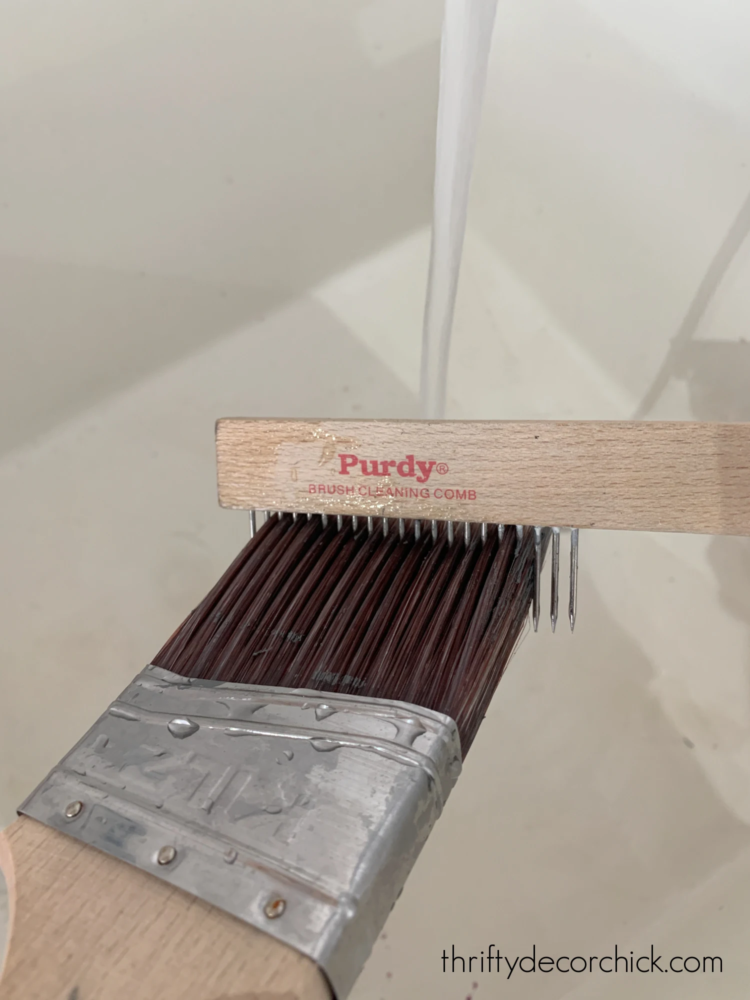 paint brush cleaning comb