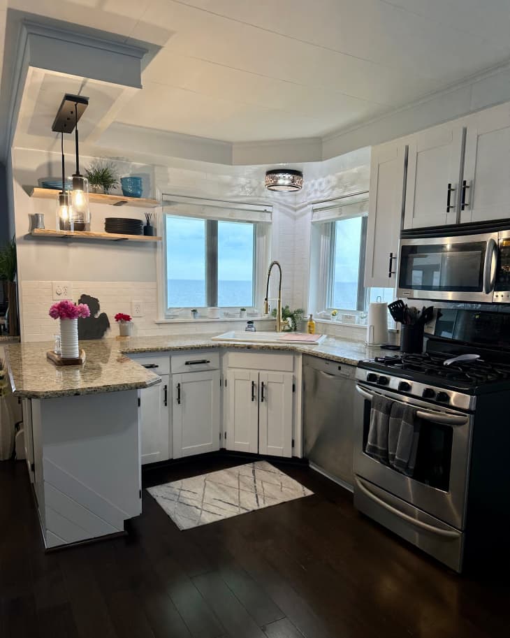 Stainless steel appliances in newly renovated kitchen.