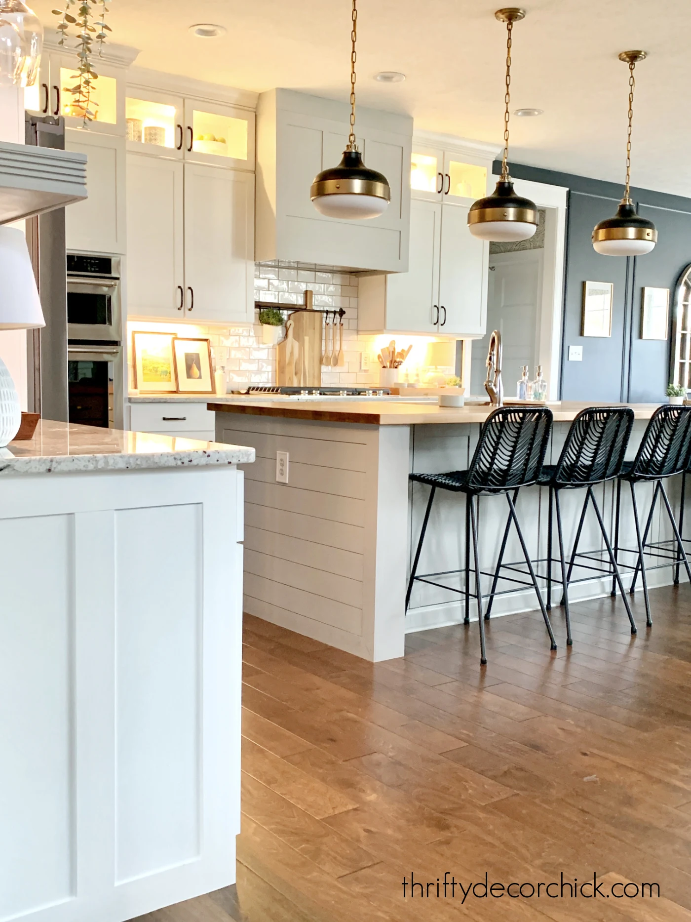 white kitchen with black brass accents