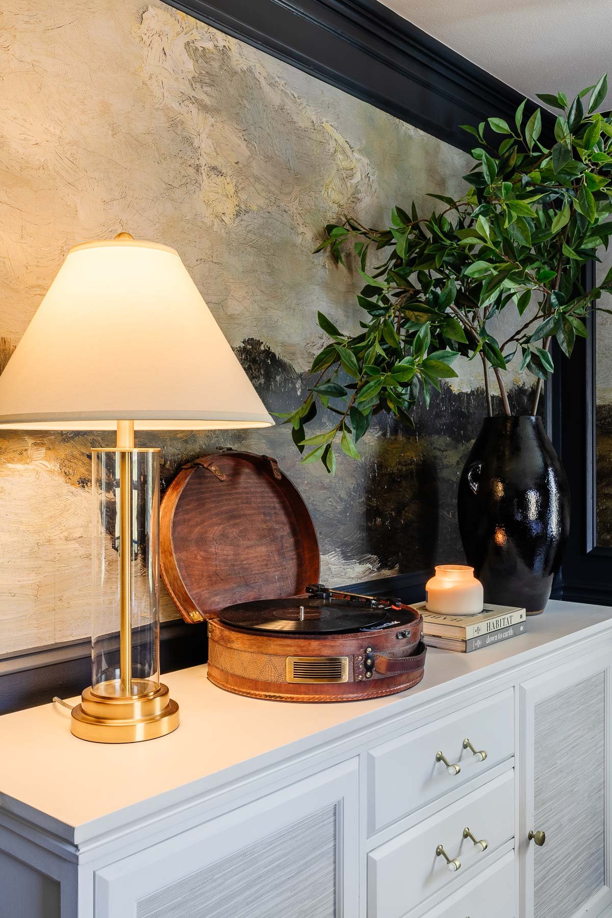 glass table lamp on a dining room buffet table with record player