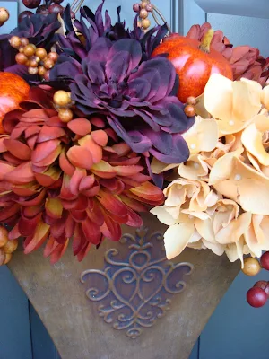 fall flowers in metal hanging