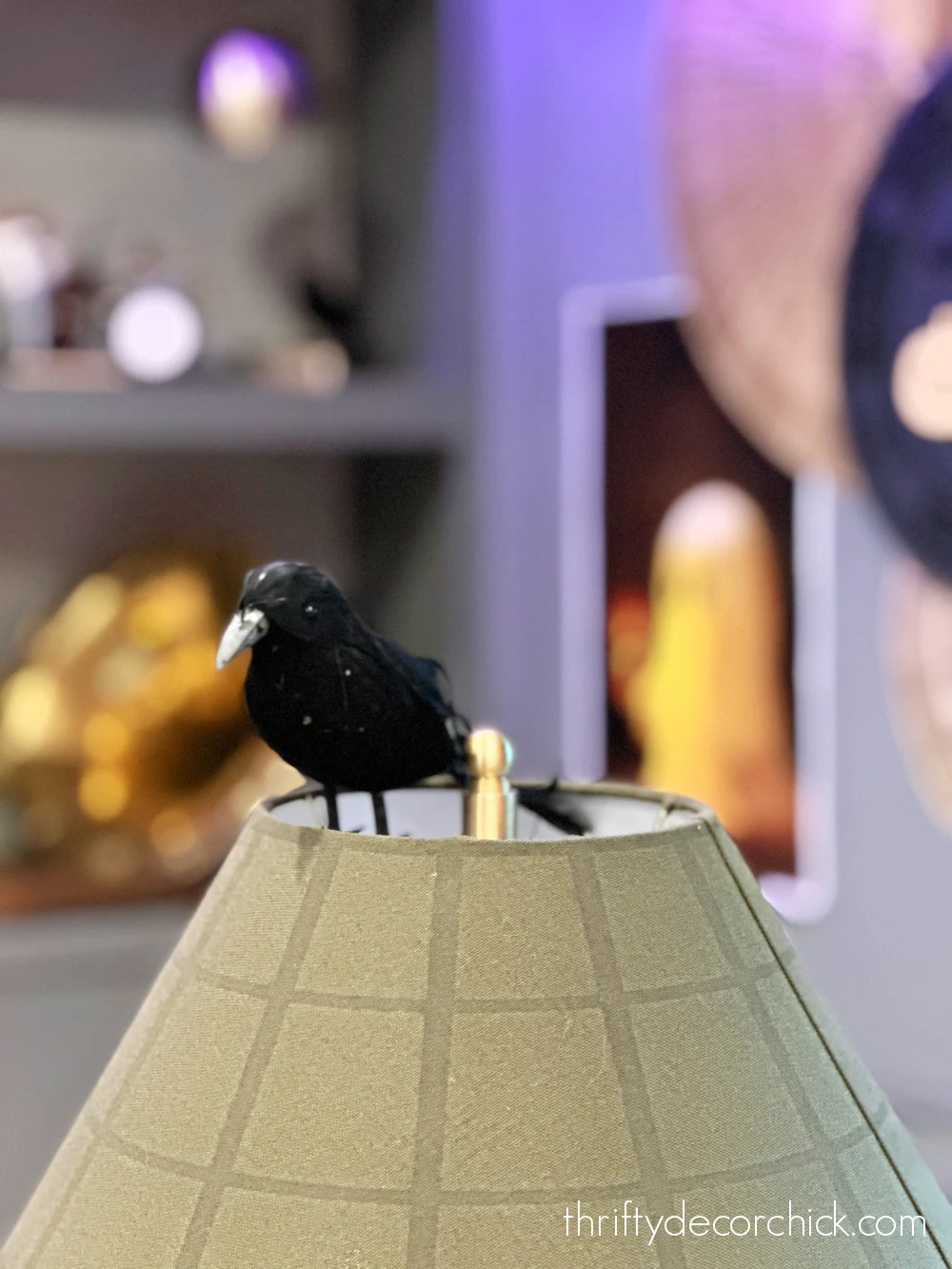 black Halloween crow on lamp