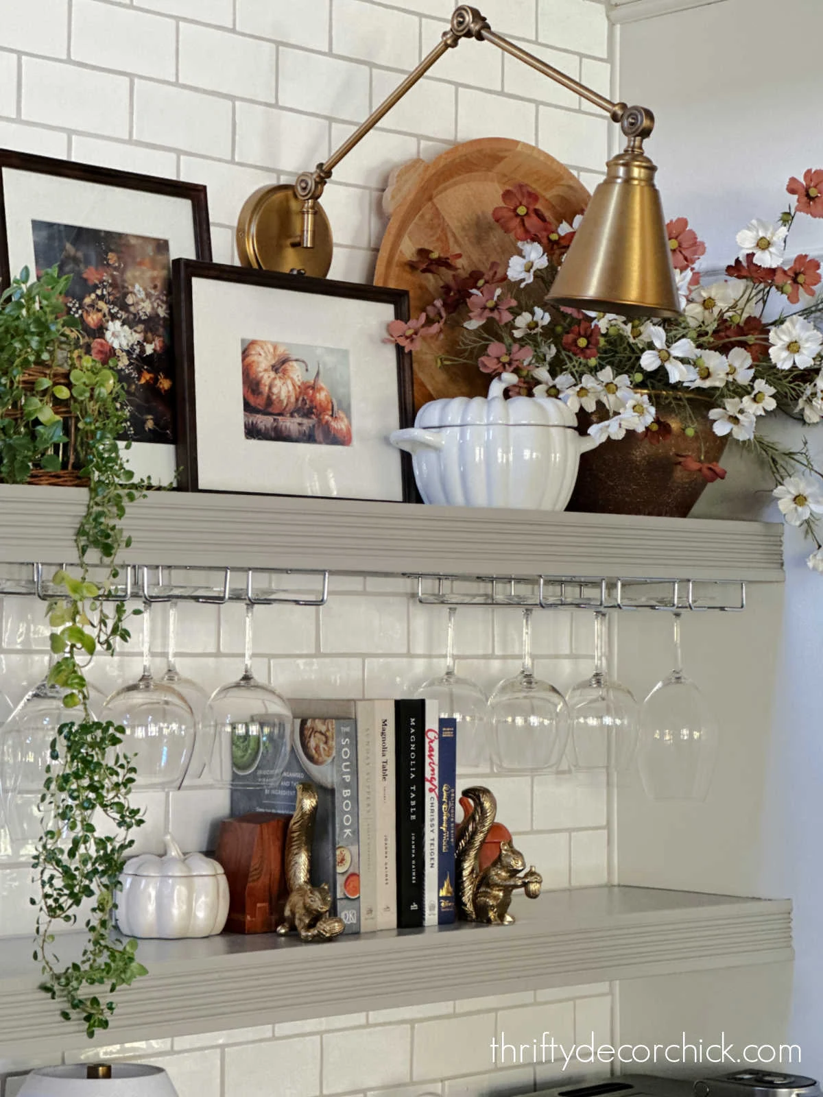 fall decor floating shelves by fridge