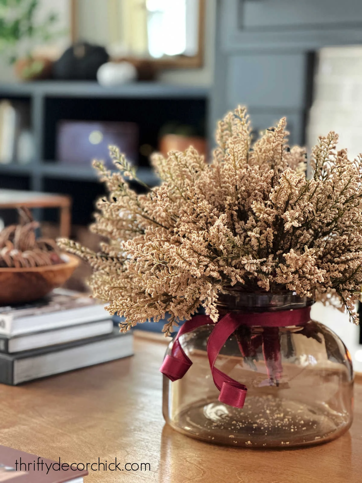 dried berries in amber vase