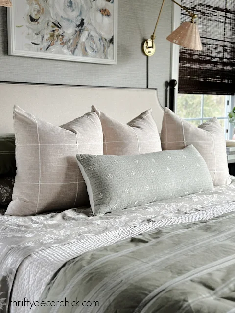 neutral cream windowpane pillows on bed