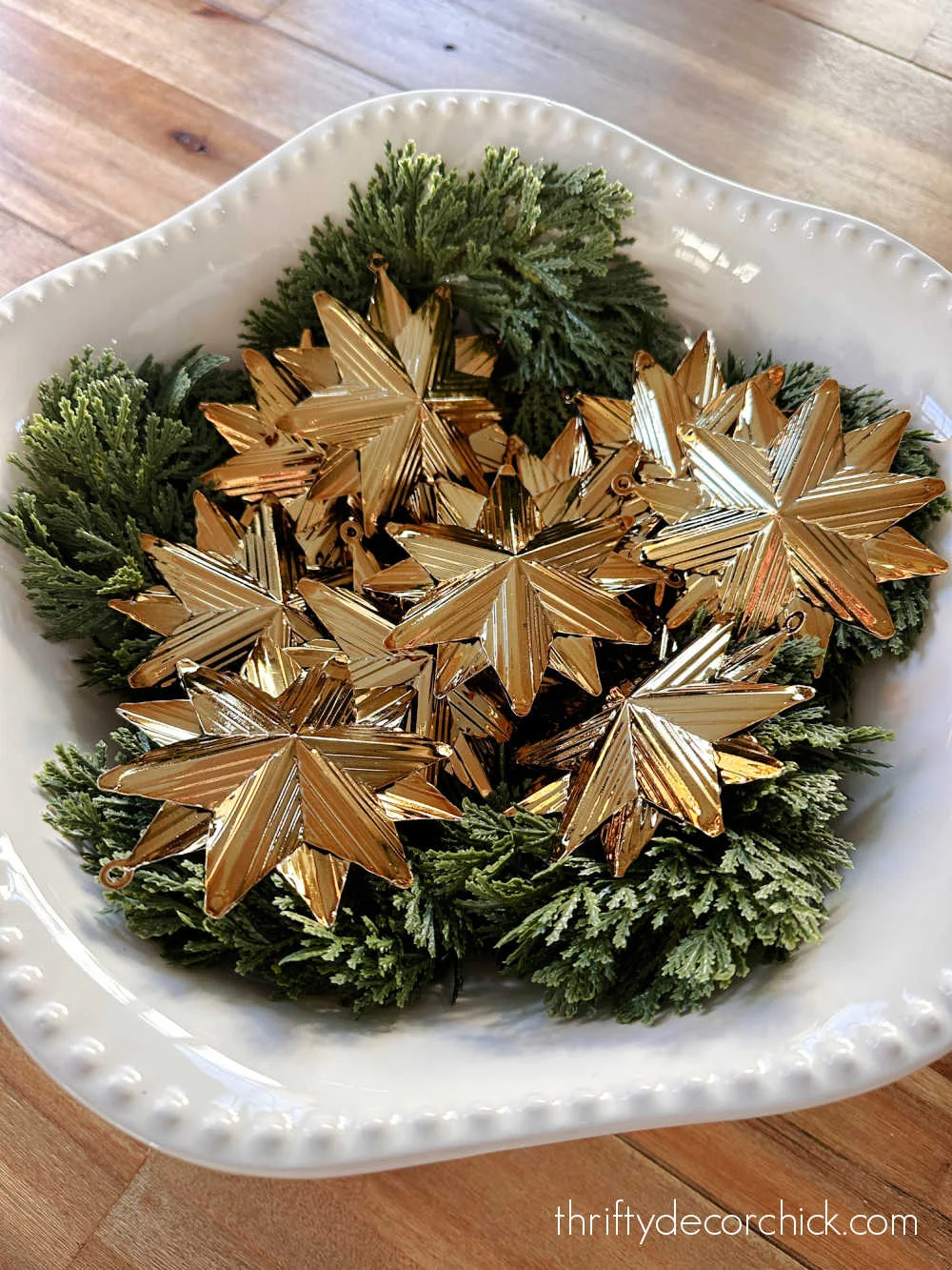 gold star ornaments in bowl