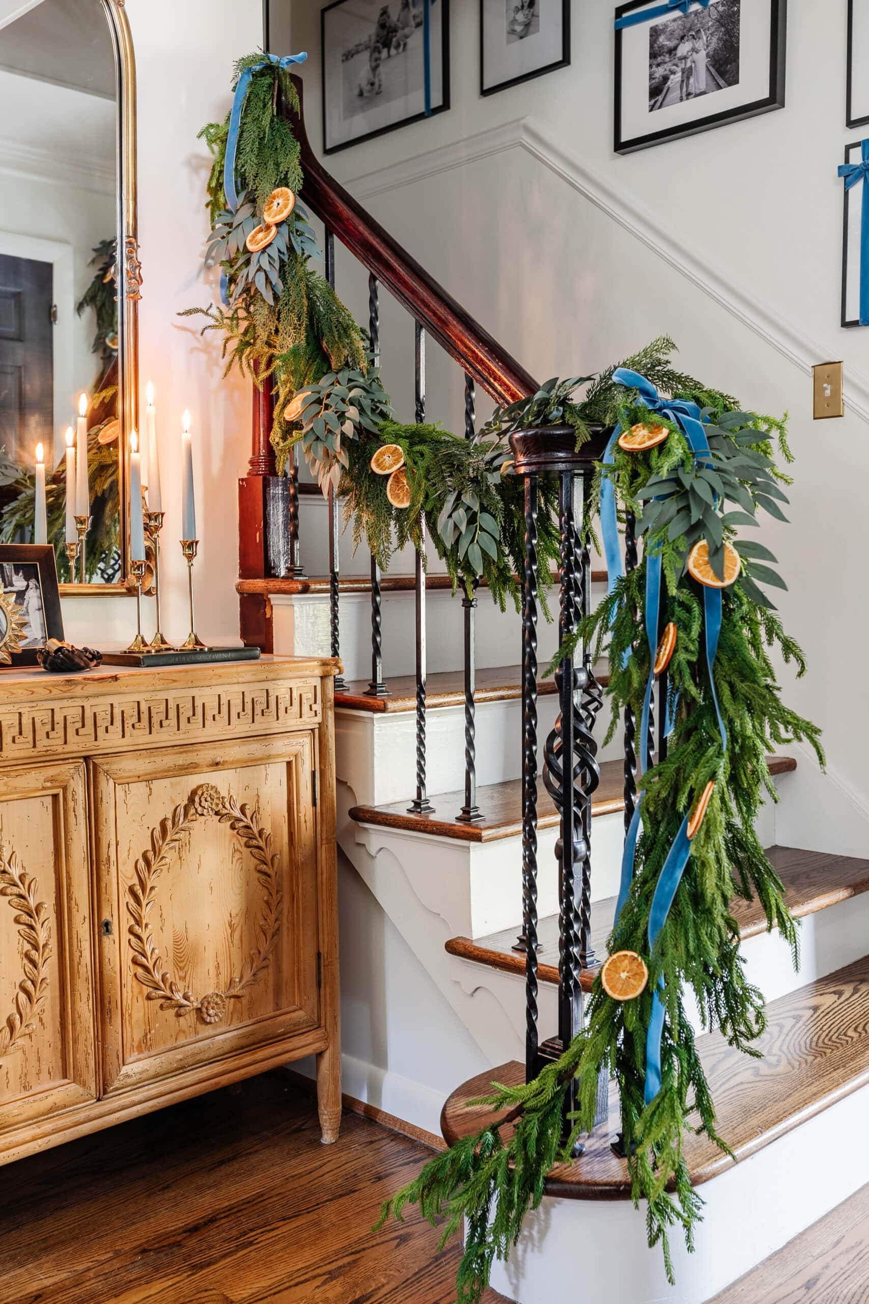 realistic garland on staircase railing